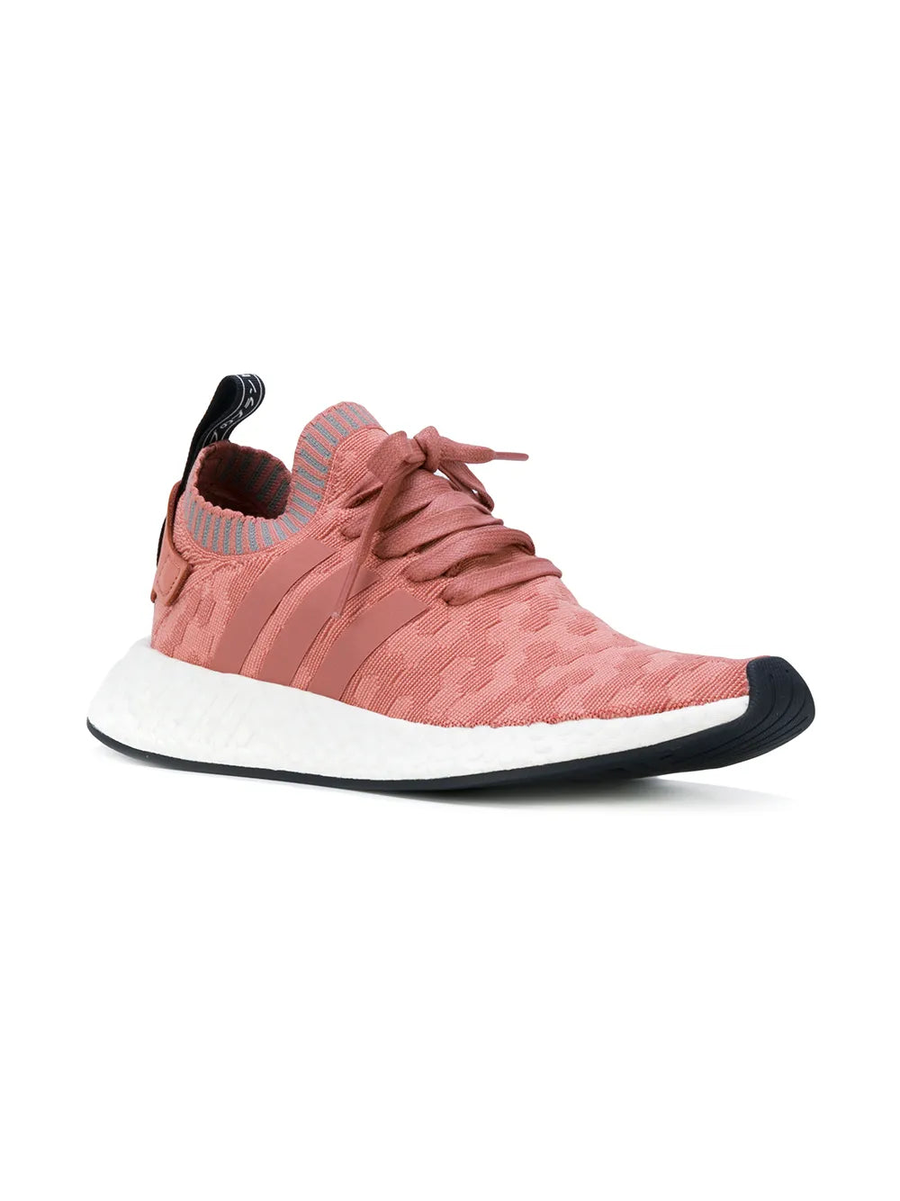 Pink knit lace-up running shoe with black heel pull tab, sock collar, and white sole