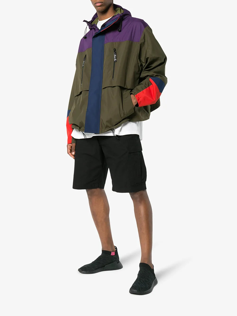 Black sock-style slip-on sneaker on foot, textured upper and midsole