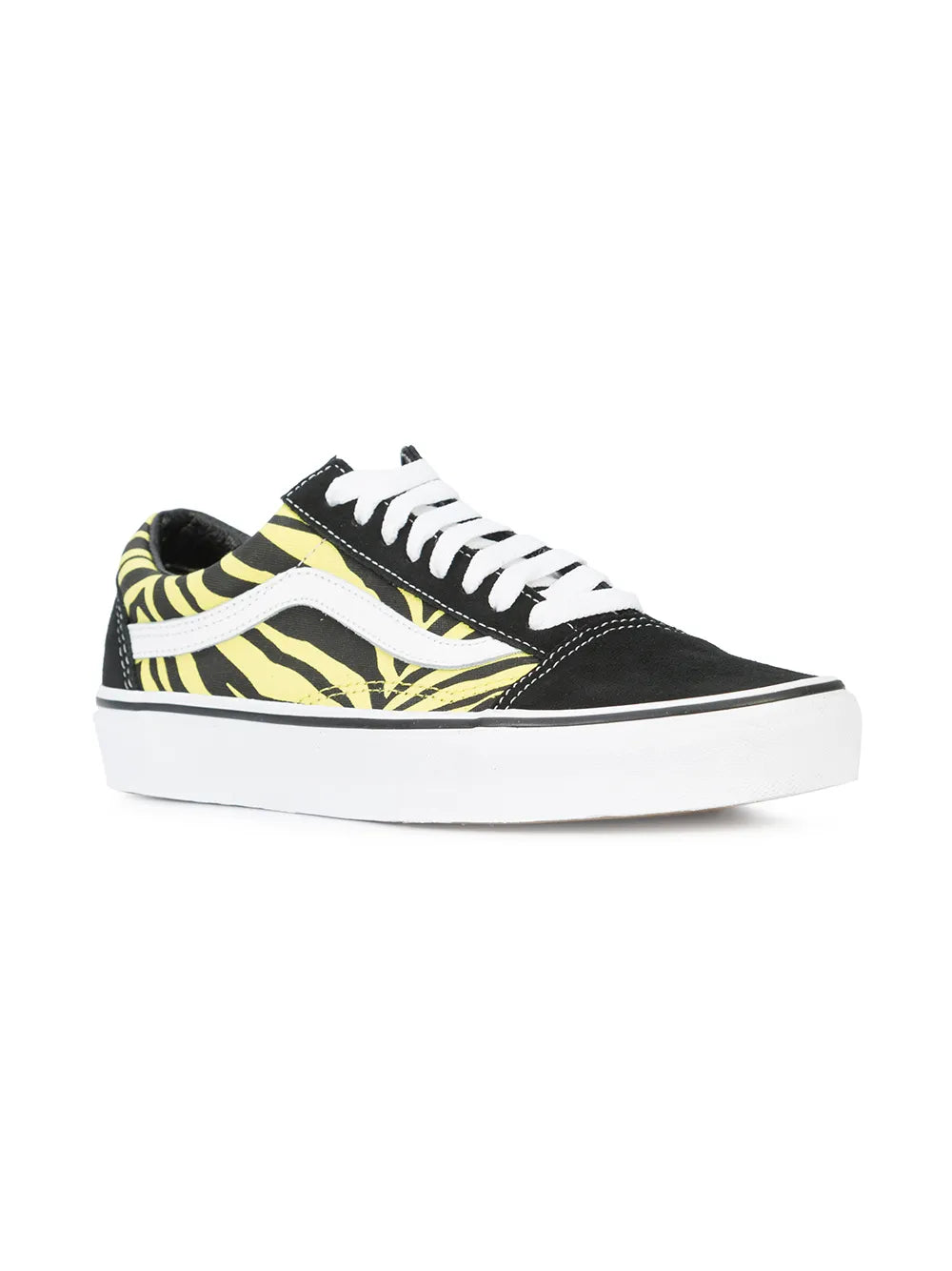 Black low-top skate shoe with yellow zebra side panel and white lace-up