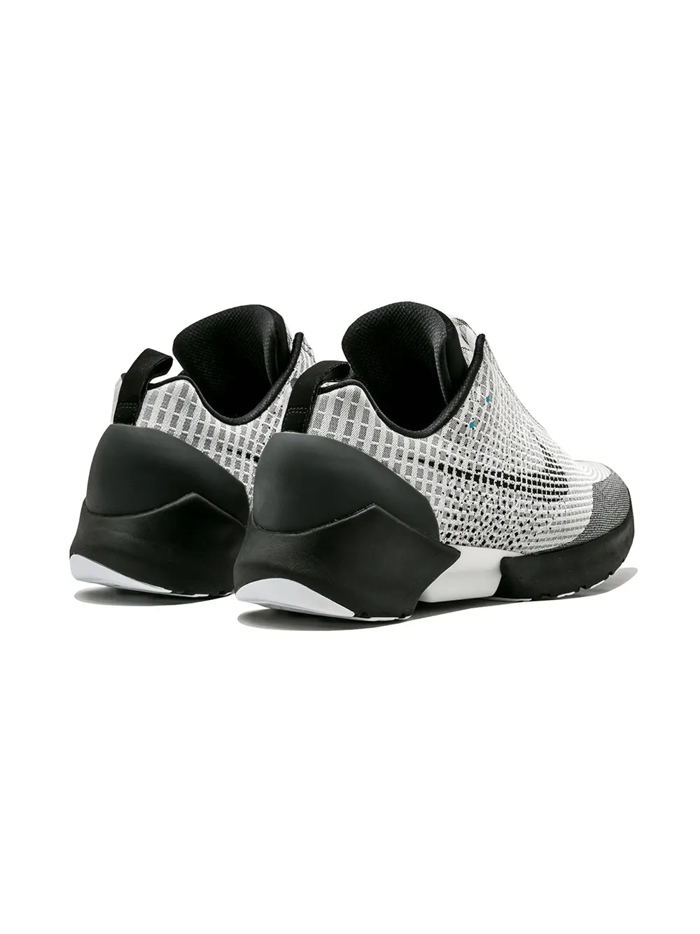 Sneaker pair back/heel view with white knit, black heel counters, and cushioned collar