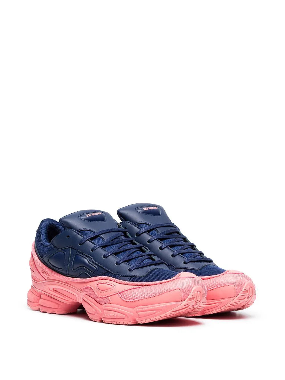 Navy blue lace-up Ozweego sneakers with chunky pink midsole and tread sole