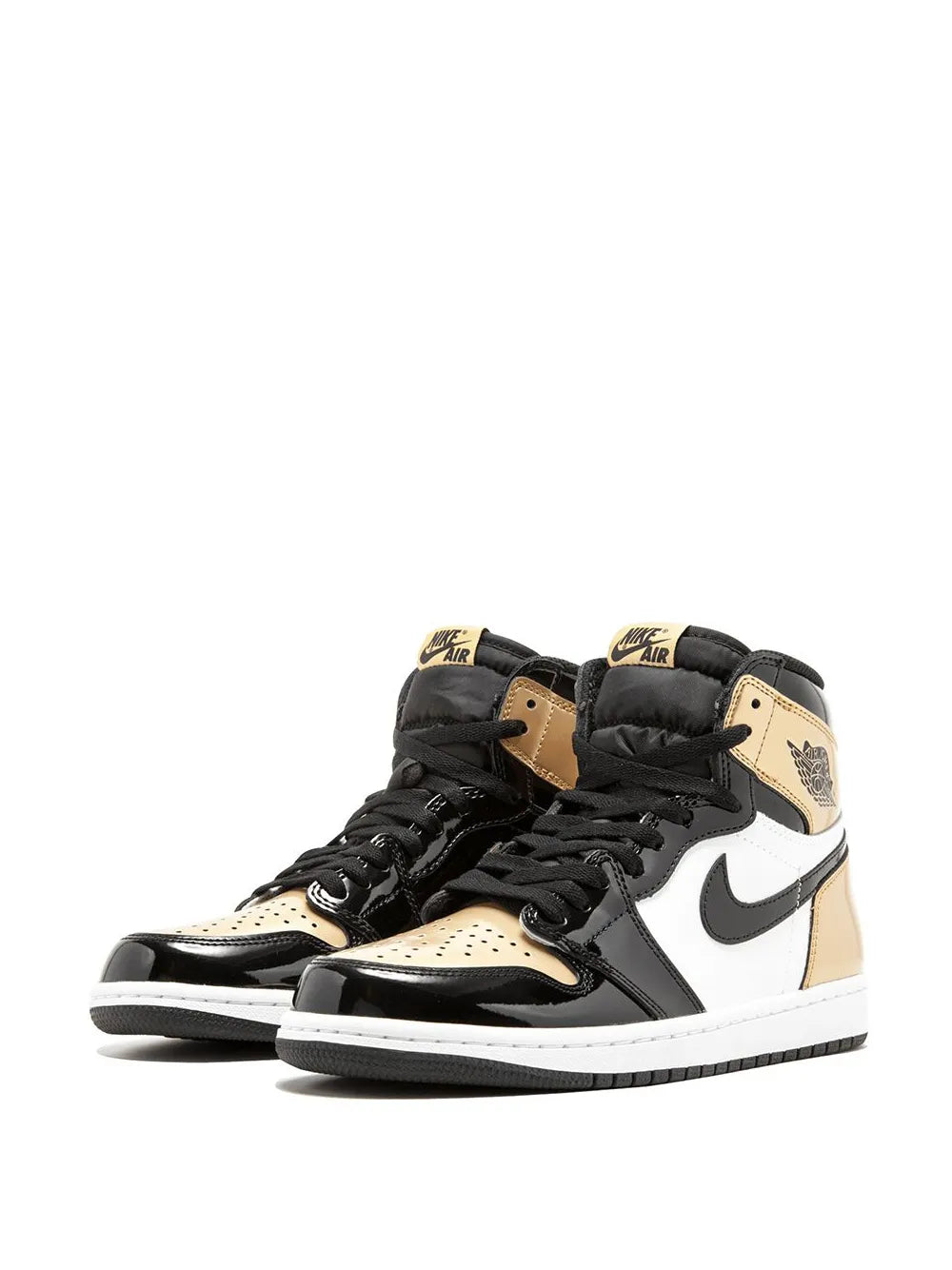 Pair of high-top sneakers in black, white, and gold with lace-up and wing emblem