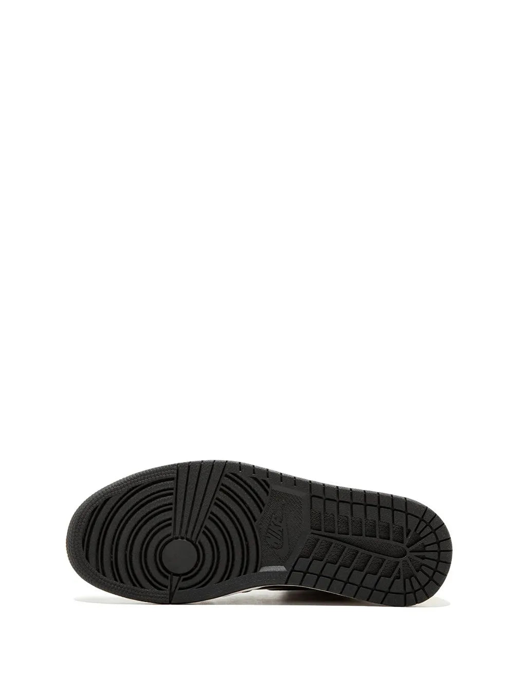 Black sneaker outsole with tread pattern and circular traction detail