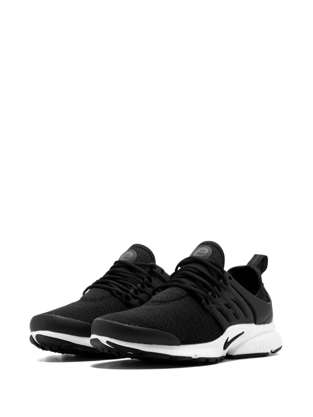 Black Nike running sneakers, lace-up style with white midsoles and Swoosh logos.
