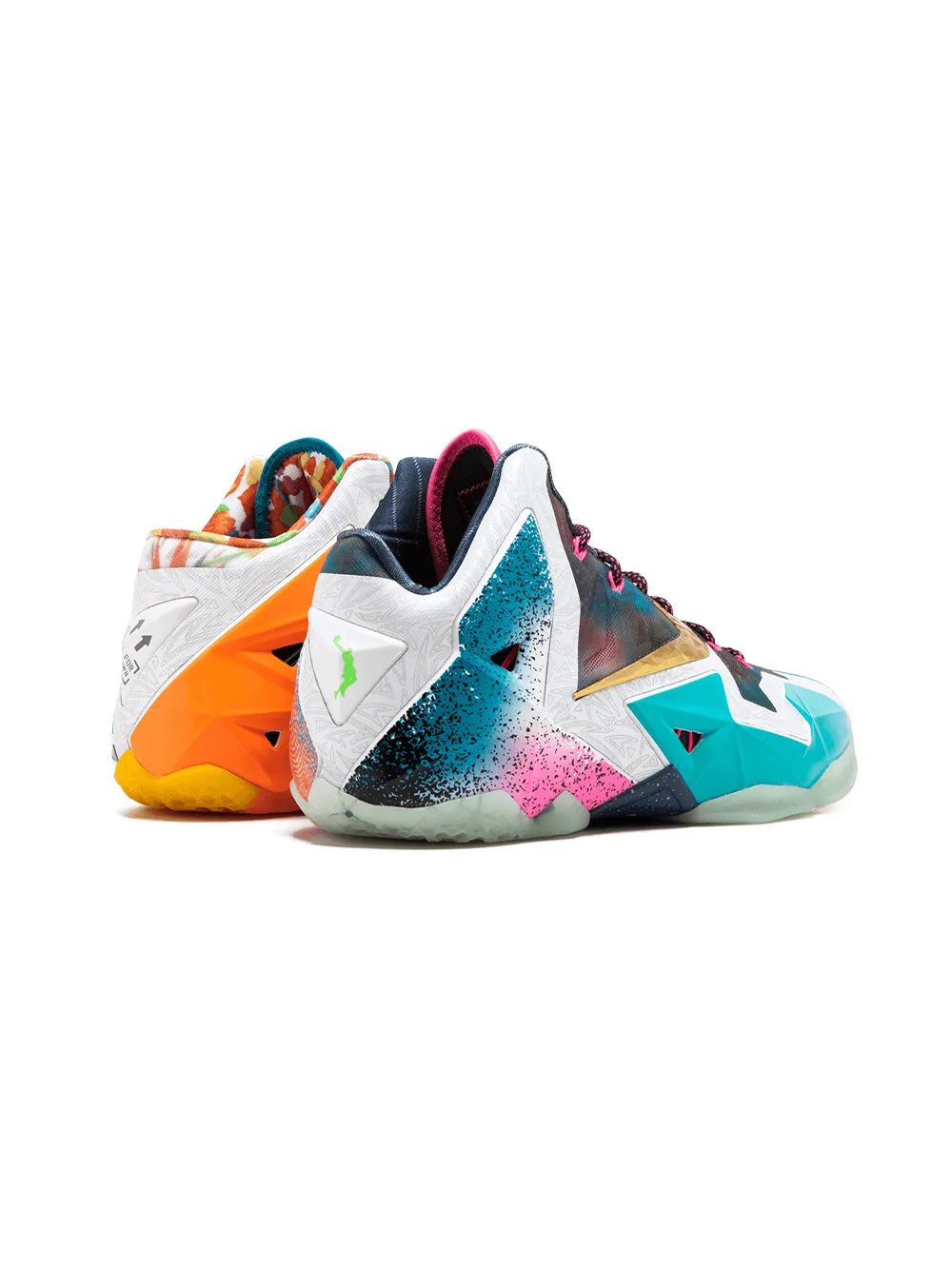 LeBron 11 Premium basketball shoe with white base, teal and pink accents
