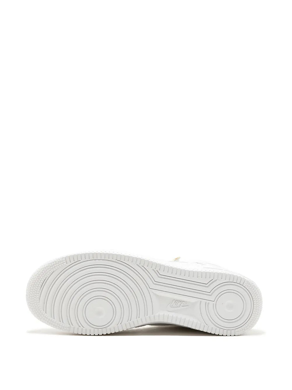 Nike white high-top sneaker outsole tread with circular traction pattern