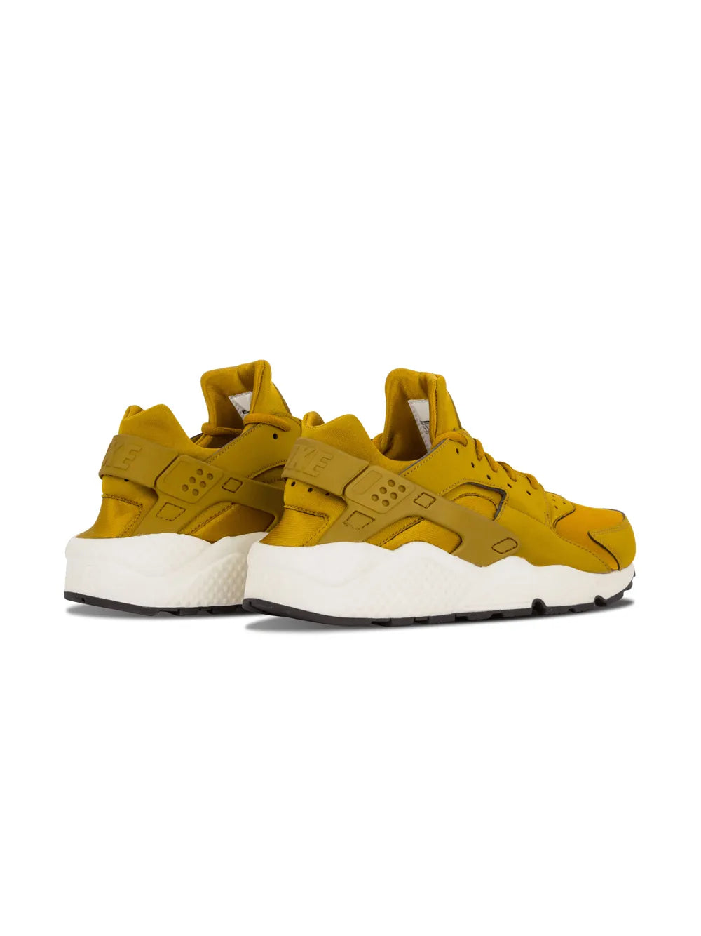 Nike Air Huarache Run sneakers, yellow uppers and white midsole with black heel