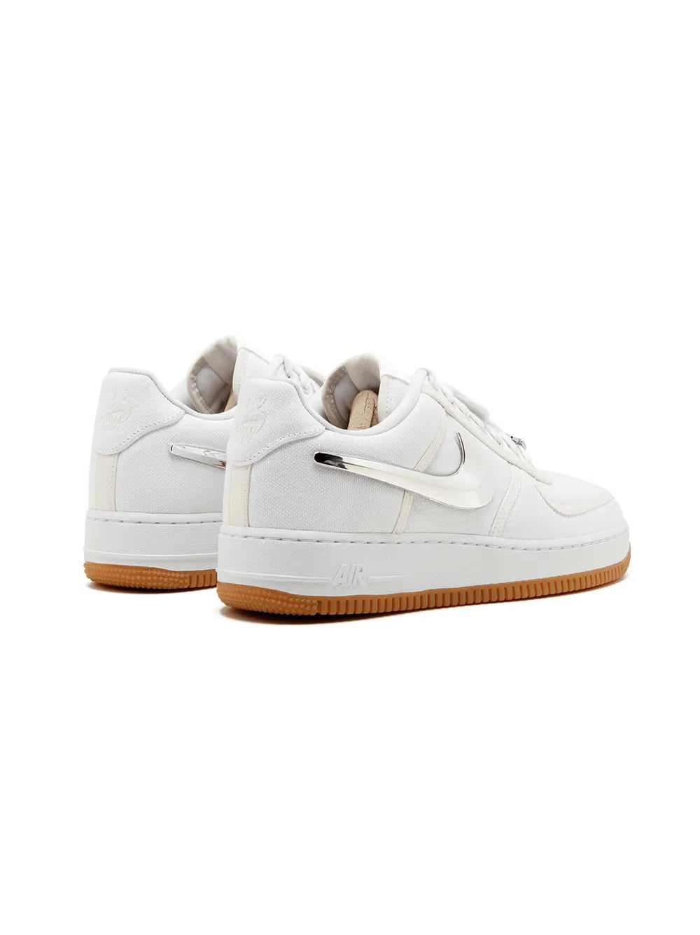 White low-top sneaker with rear heel view and gum rubber sole