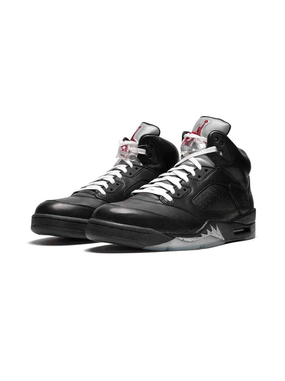 Black high-top sneakers with lace-up, silver midsole, and red eyelet accents