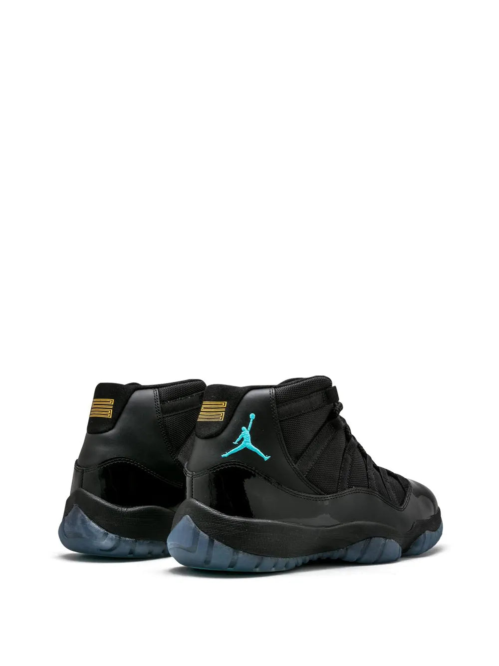 Black high-top sneakers with teal Jumpman logo and yellow heel accent