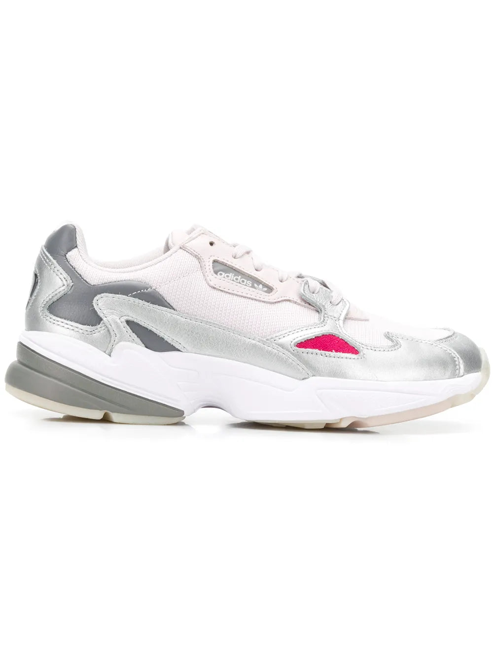 White low-top sneakers with silver overlays and pink heel accent, lace-up