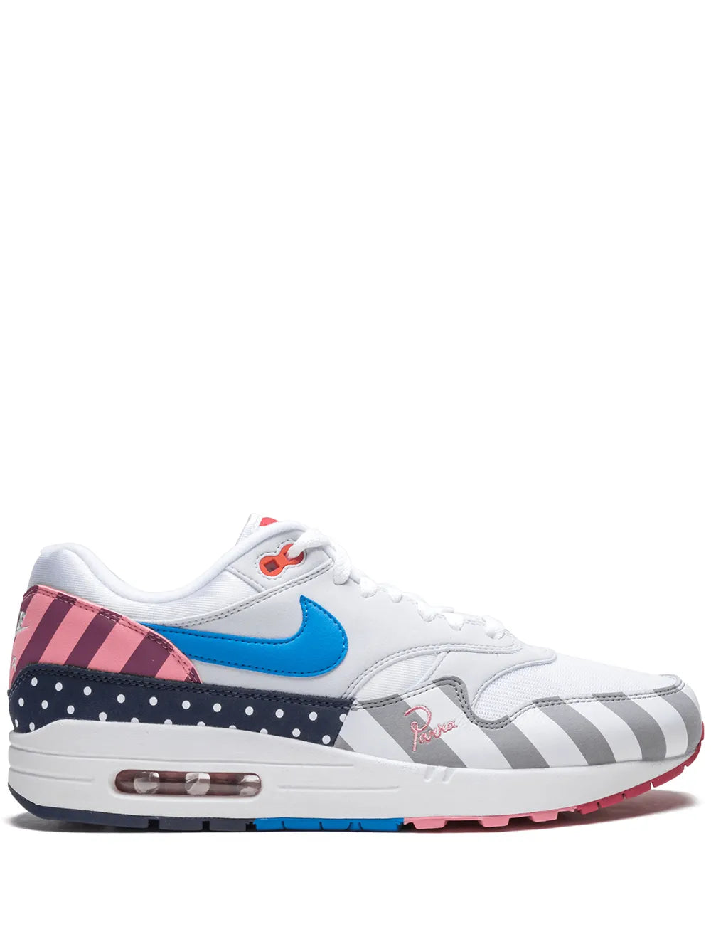 White Nike Air Max 1 sneakers with blue swoosh, red accents, air-cushion sole
