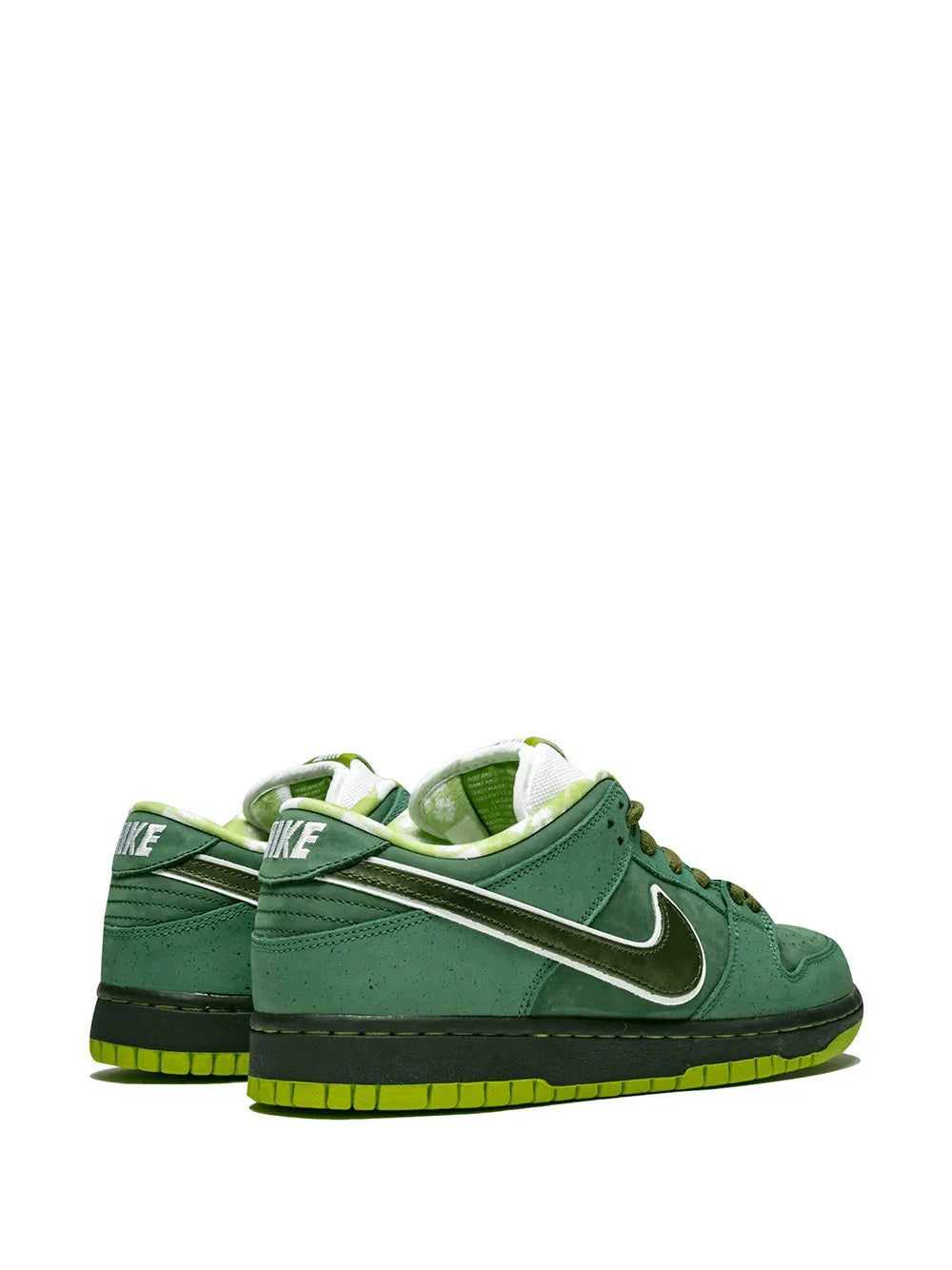 Nike SB Dunk Low Pro sneakers in green with white heel detail and neon sole