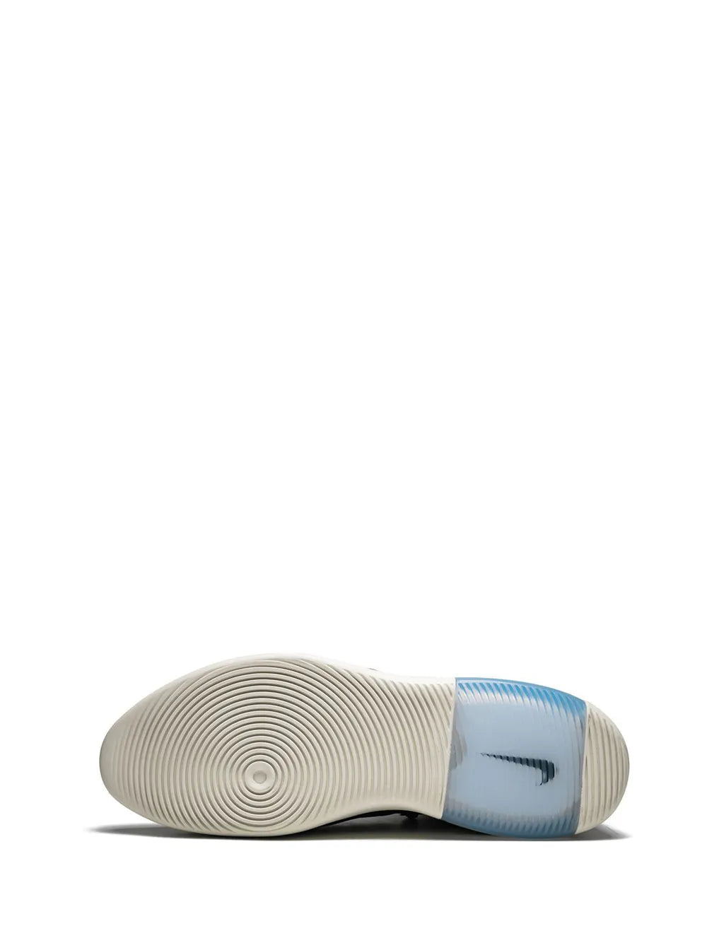 Shoe outsole with light tread and blue Nike heel tab, heel view