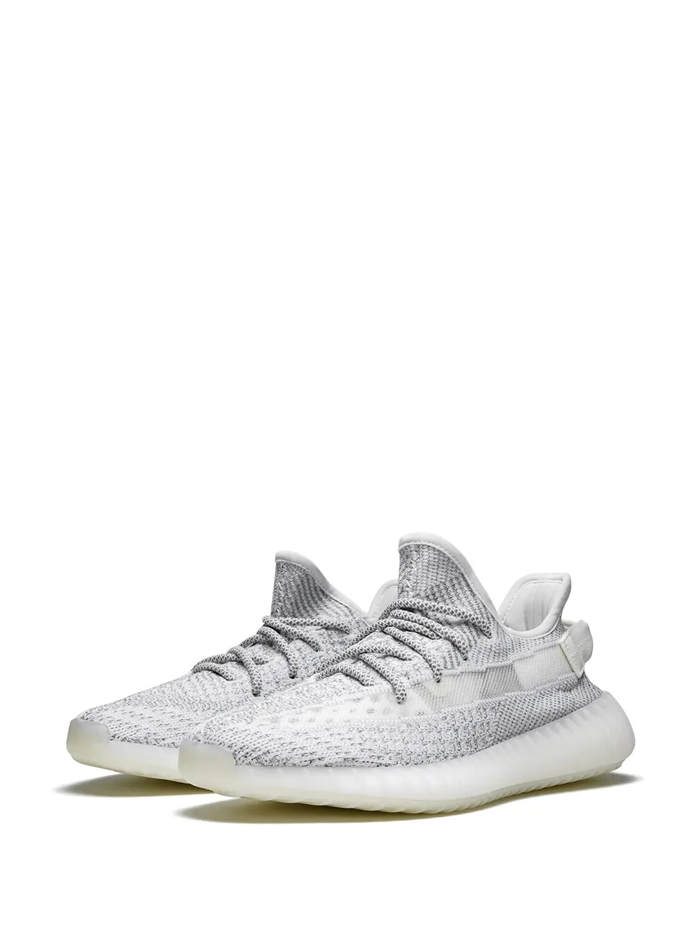 White reflective knit sneaker, side view, lace-up closure and thick Boost-style midsole