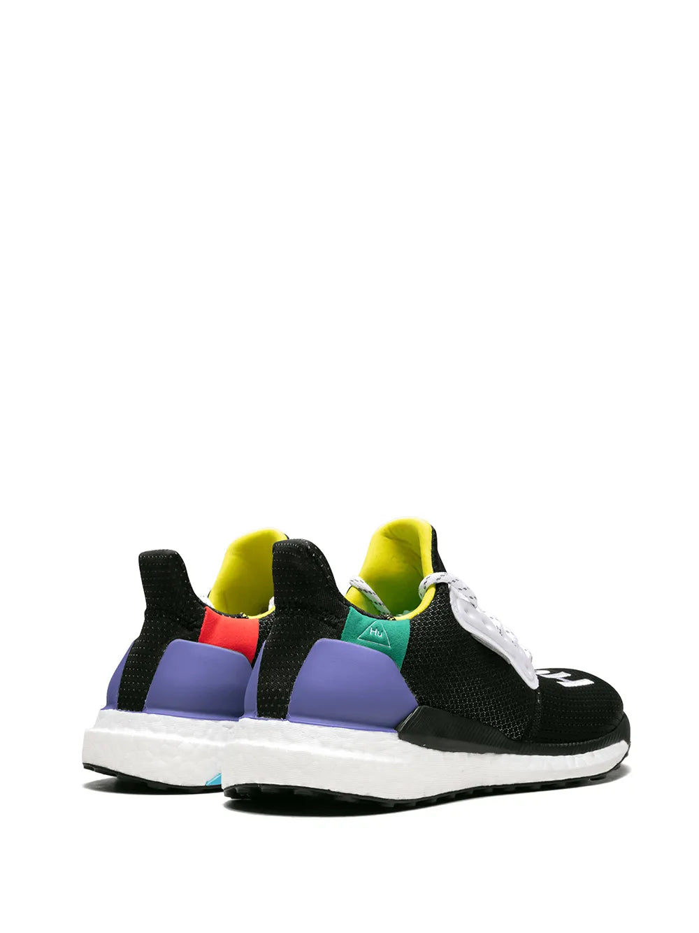 Black sneaker with purple and neon yellow heel tabs, white lace-up front.