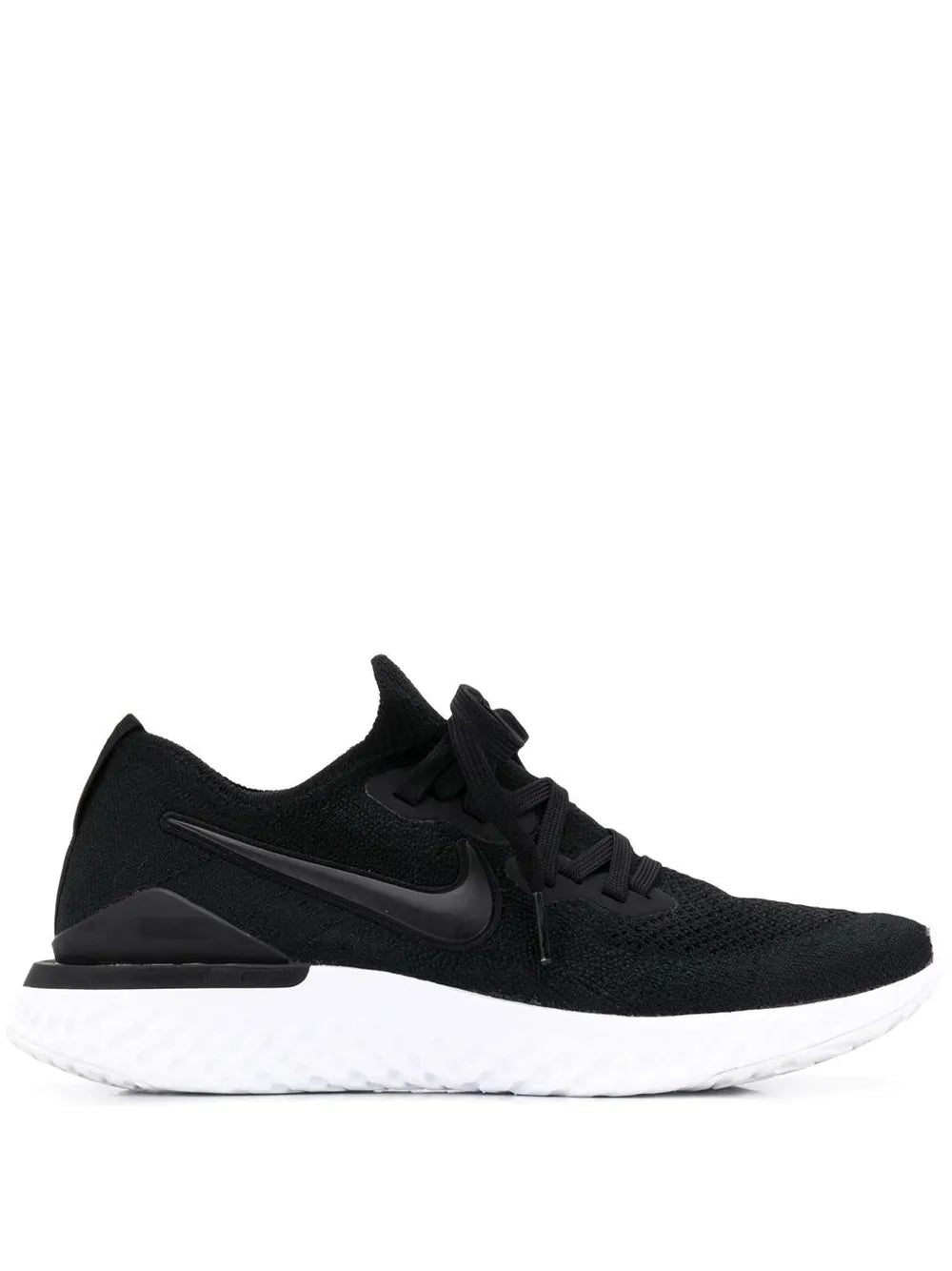 Black Nike running sneaker with black Flyknit upper and white React foam midsole