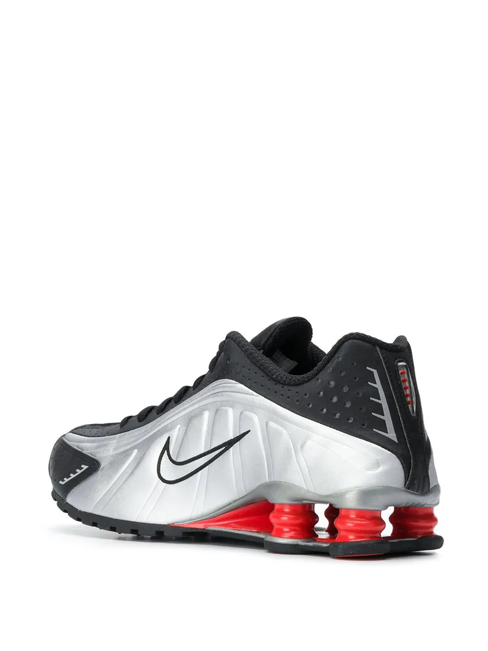 Black and white Nike Shox R4 sneaker with red heel air pods and lace-up closure