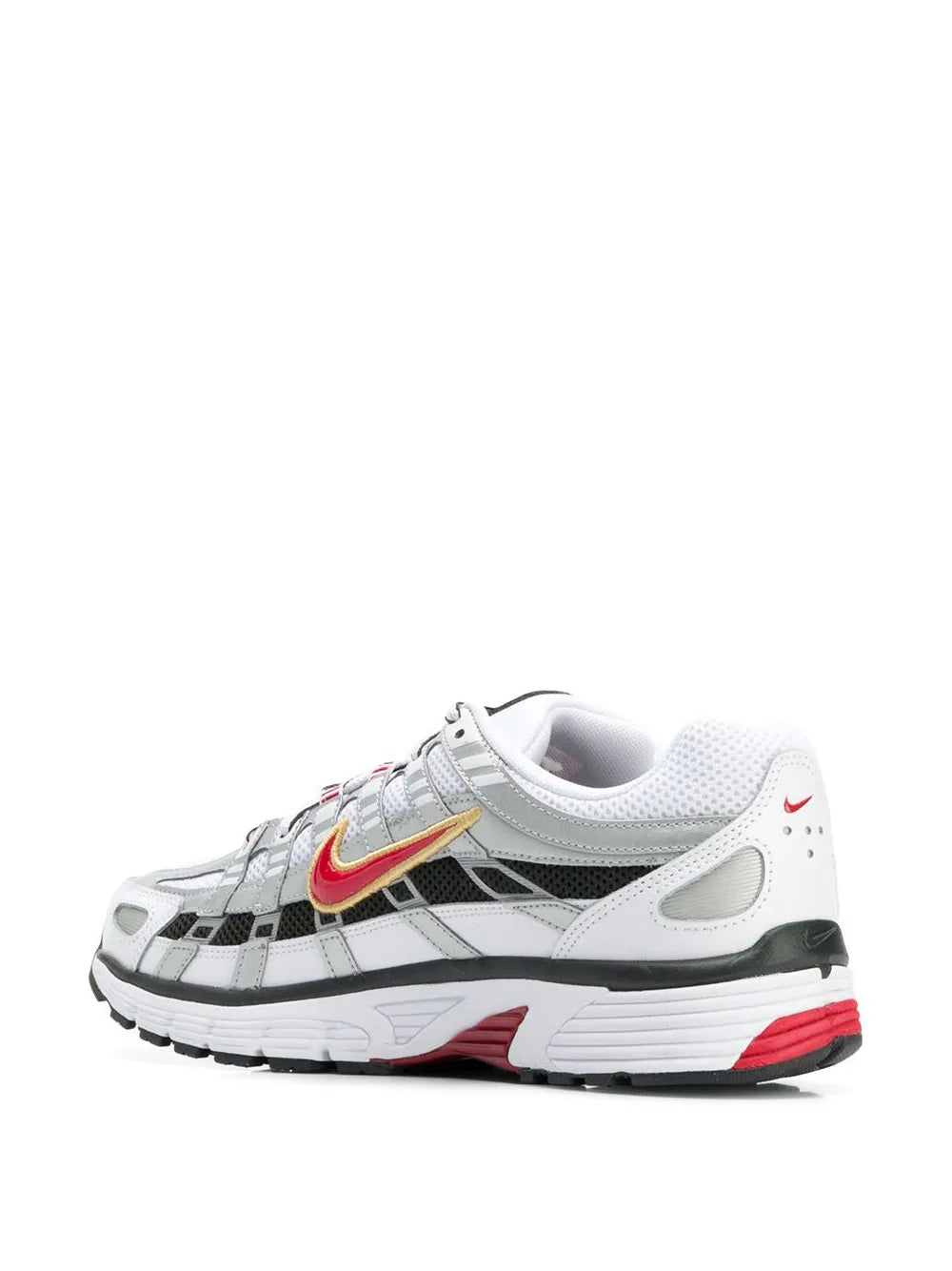 White running sneaker with Nike swoosh, black panels, red heel and midsole.