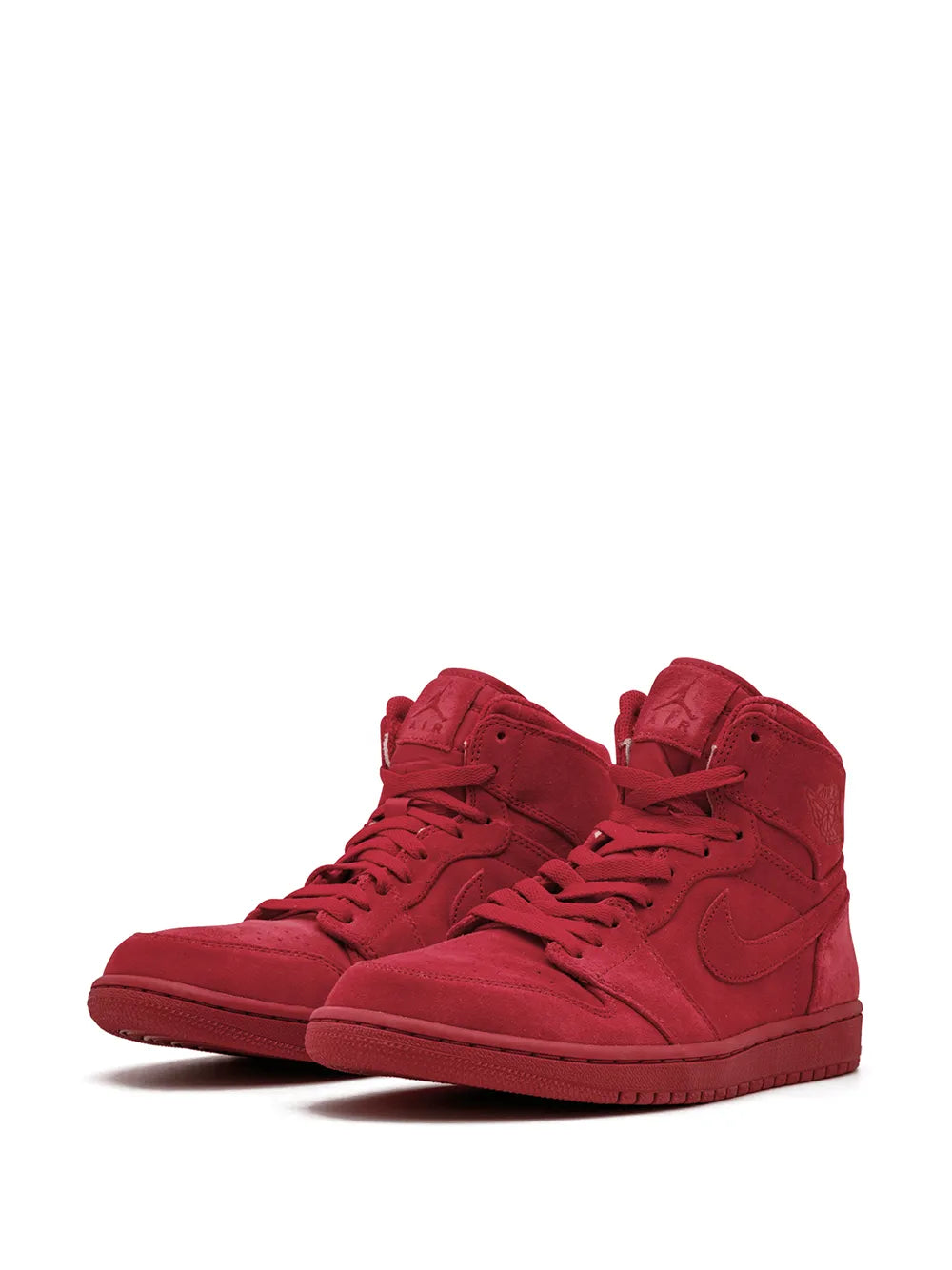 Red suede high-top sneakers with laces, angled side view