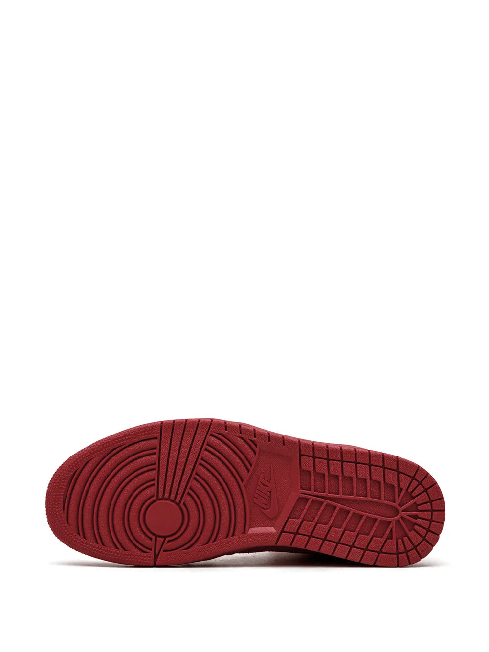 Red suede Air Jordan 1 outsole with textured tread, bottom view