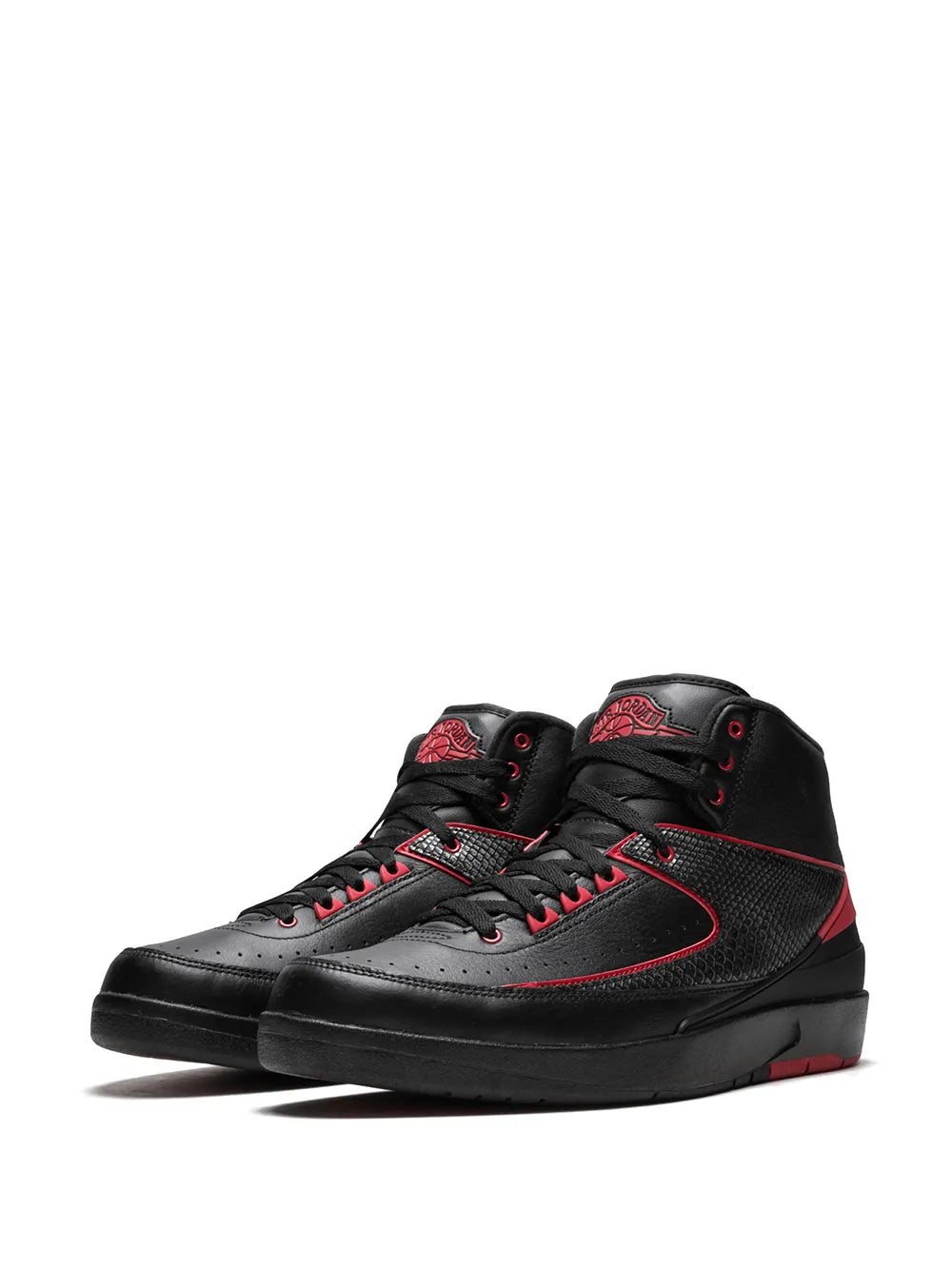 Black high-top sneakers with red piping, textured side panels, and lace-up closure