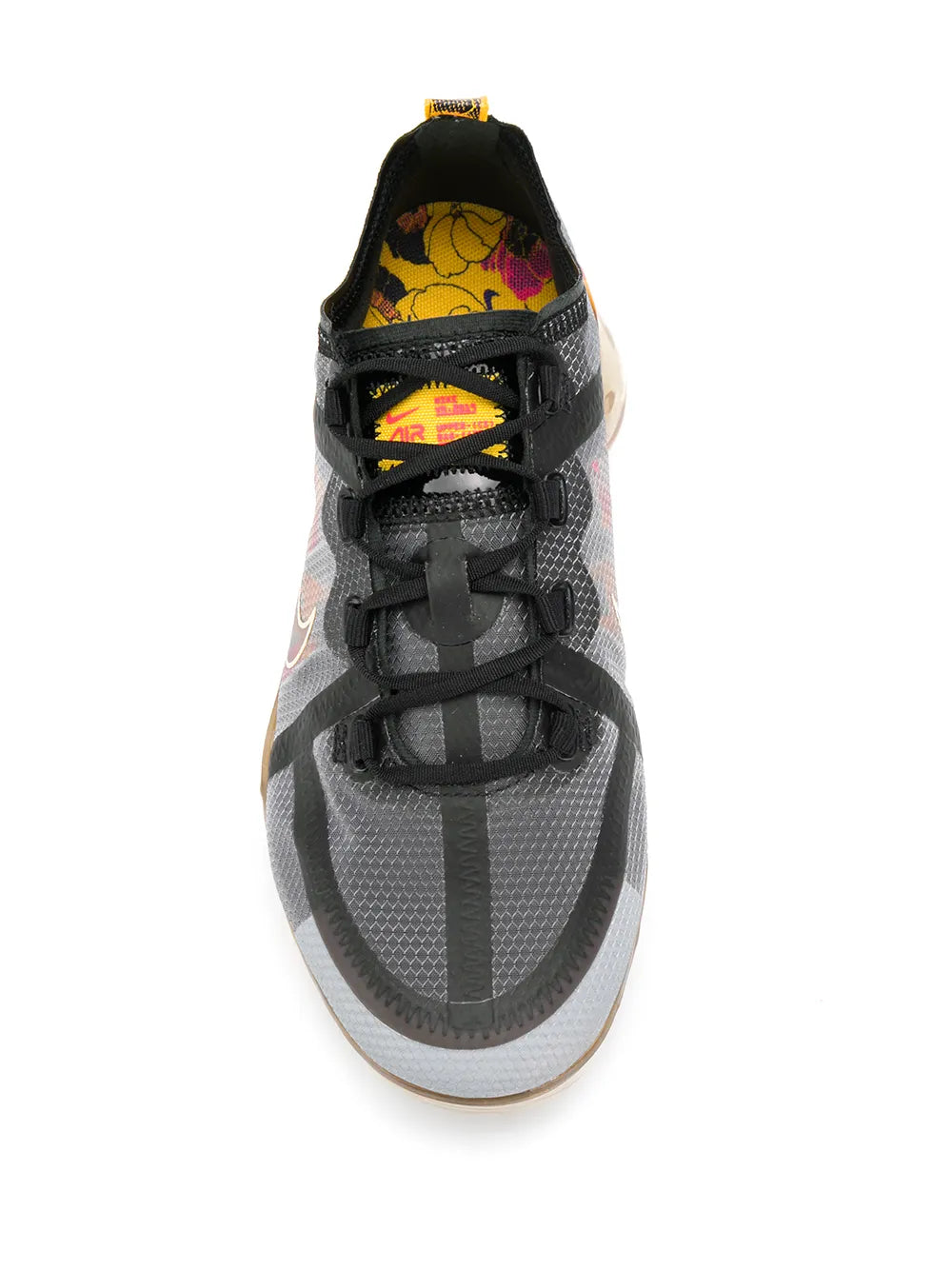 Gray mesh running shoe with black laces and cushioned tongue, top view