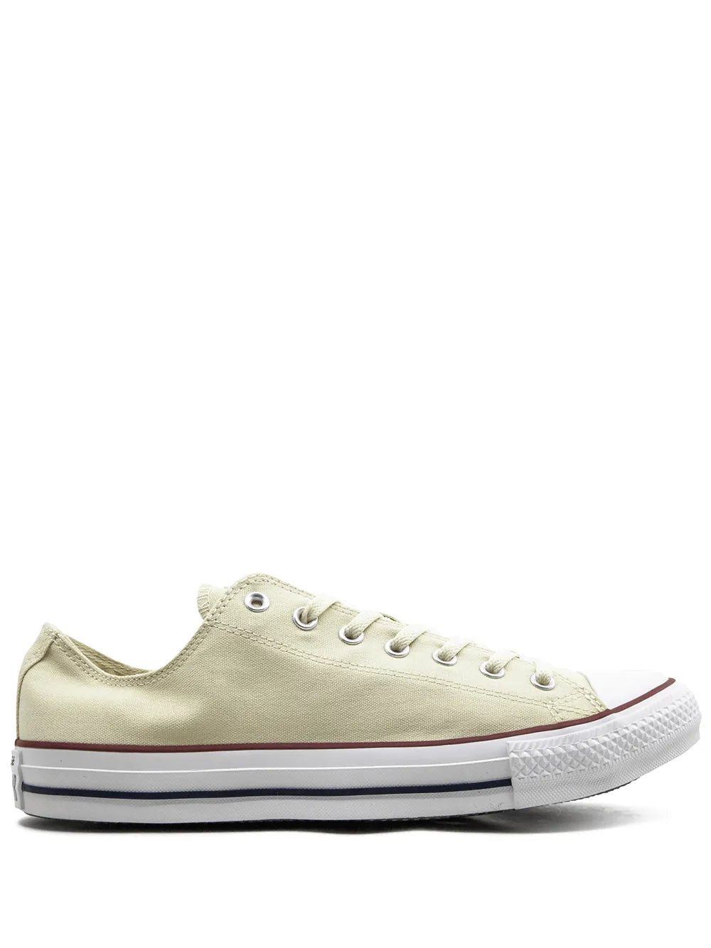 Cream canvas low-top sneakers with red trim and white rubber sole