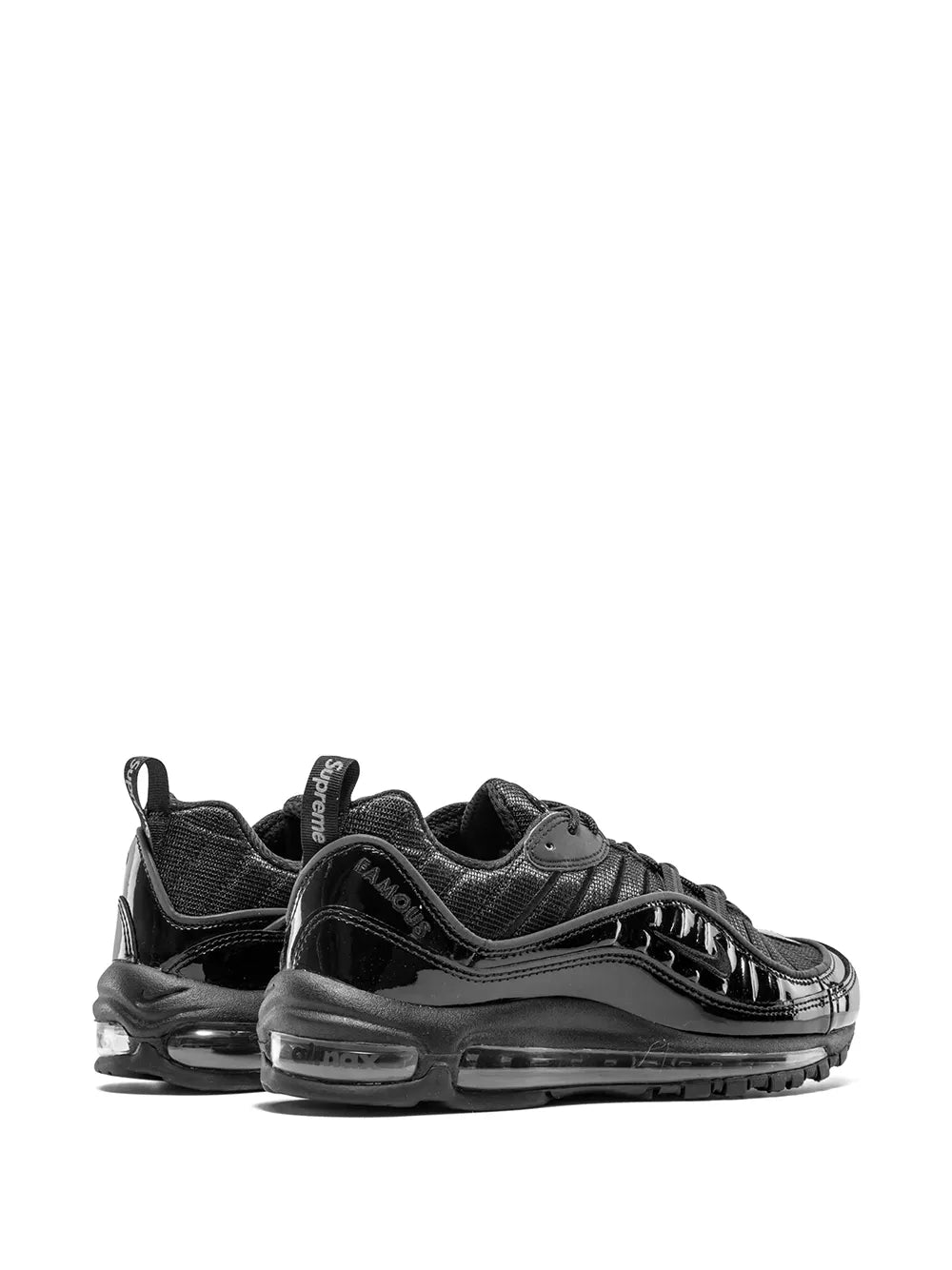 Nike Air Max 98 sneaker in black, front/side angle with glossy toe and Air pods