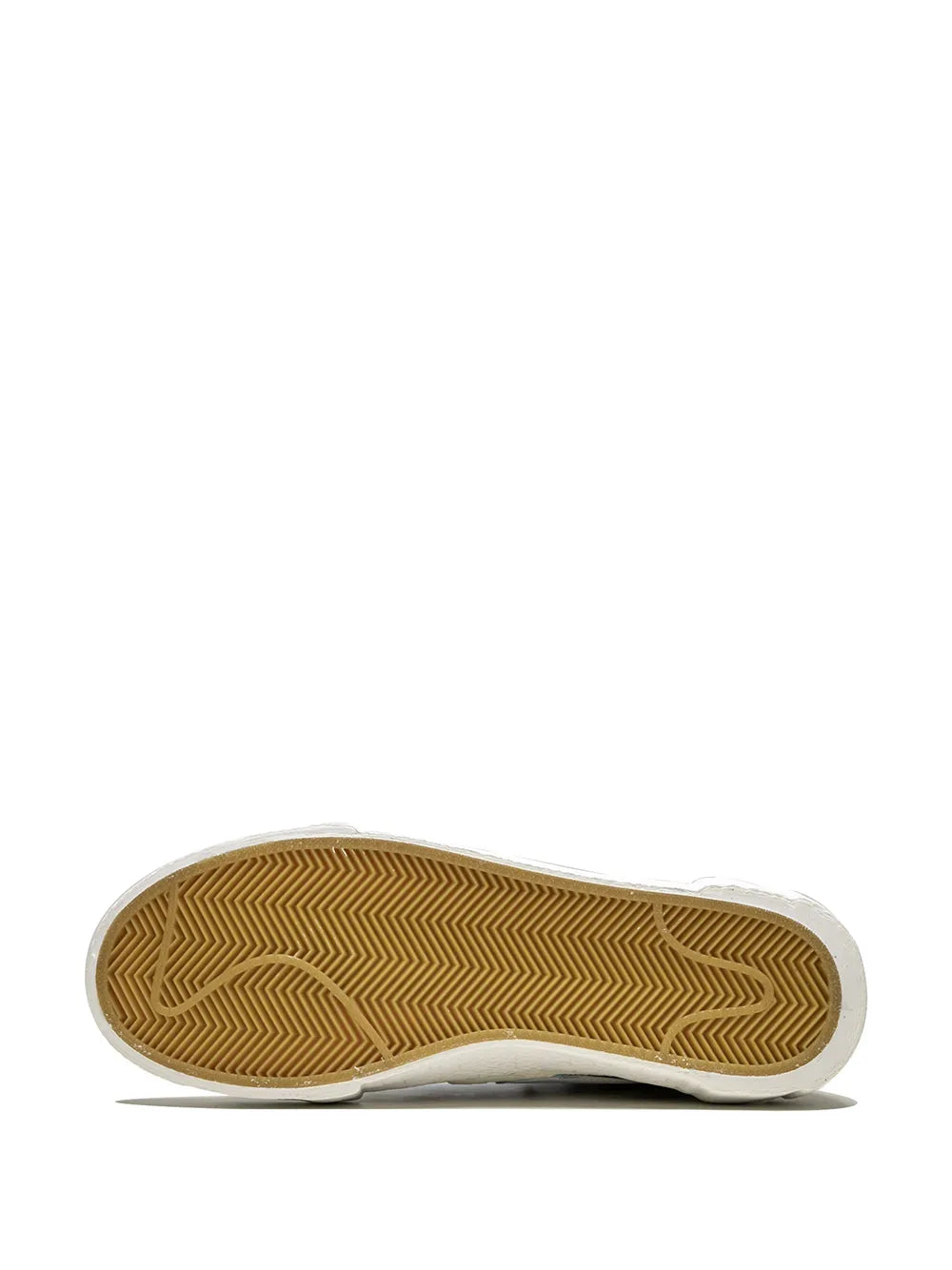 Rubber outsole with zigzag tread on off-white midsole