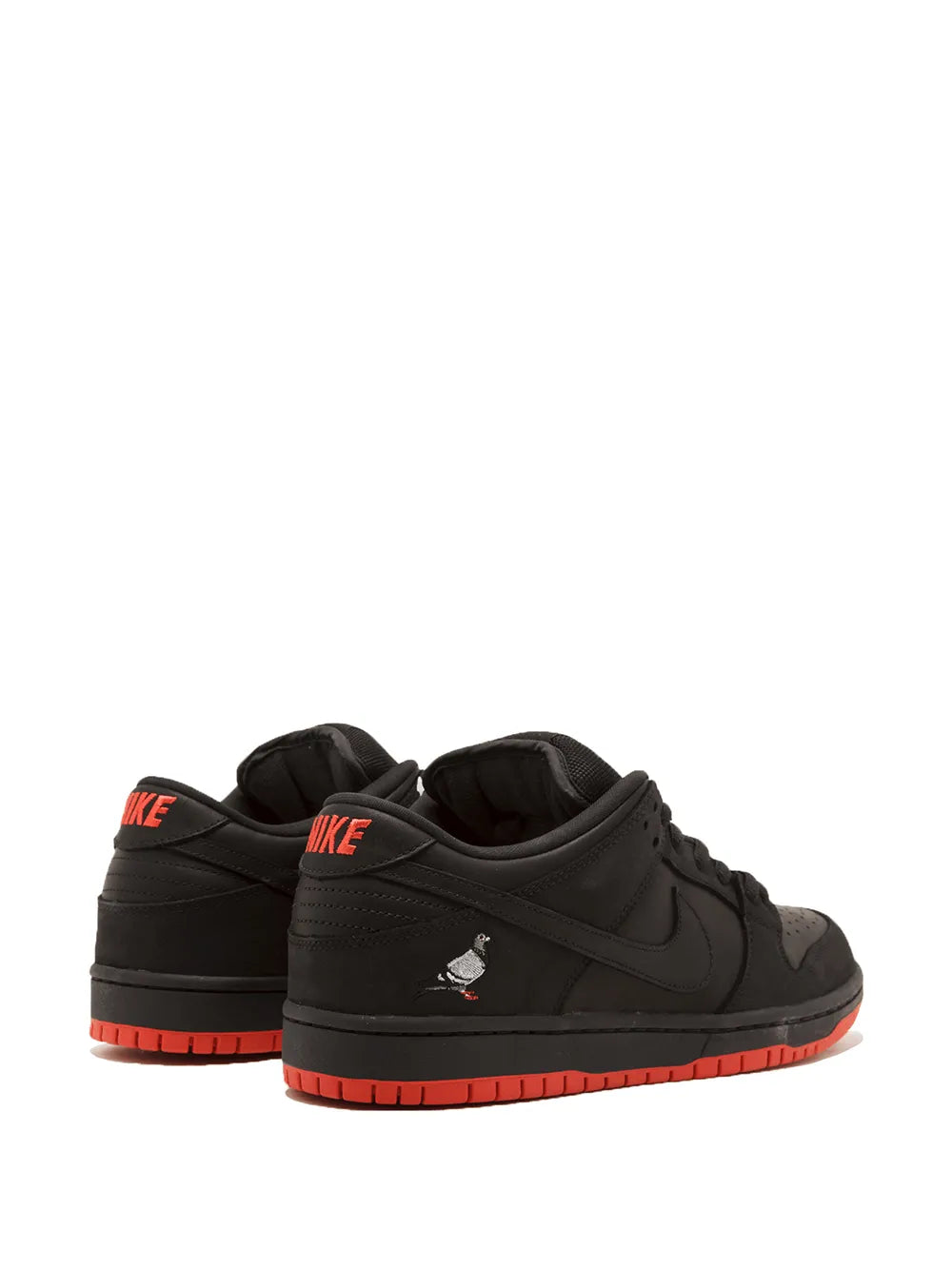 Black Nike SB Dunk Low TRD QS sneakers, rear/heel view with red outsole