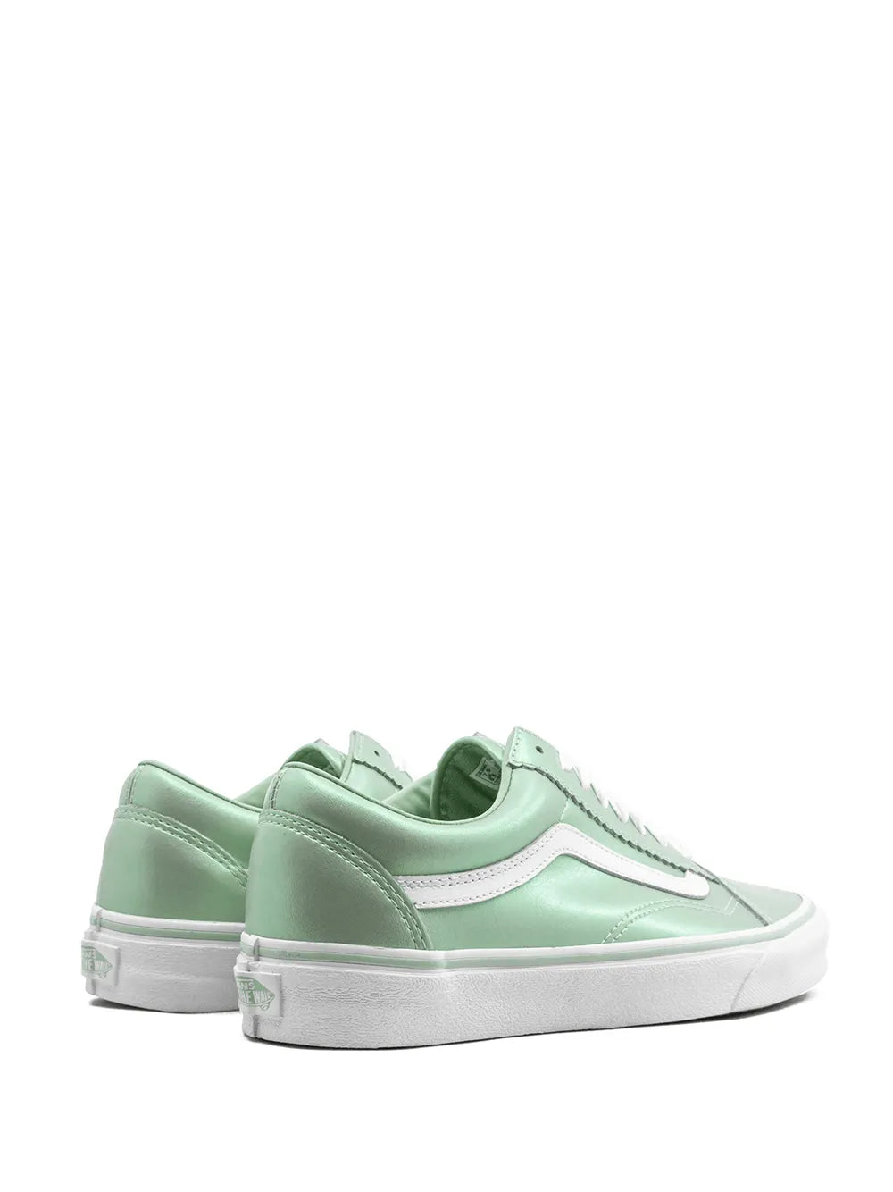 Pair of mint green low-top lace-up sneakers with white side stripe and sole