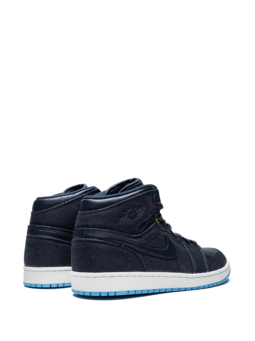 Pair of Air Jordan 1 Retro High high-top sneakers in dark navy suede, blue outsole