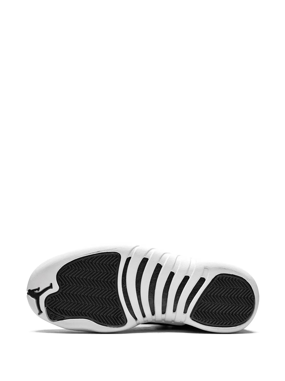 Black rubber outsole tread with white midsole and Air Jordan logo near heel
