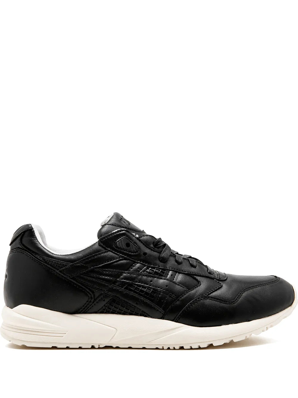 Black low-top running sneaker with leather-like overlays and white rubber sole