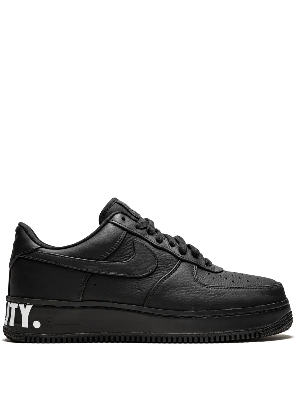 Black low-top sneakers with leather upper and lace-up Nike Air Force 1 style