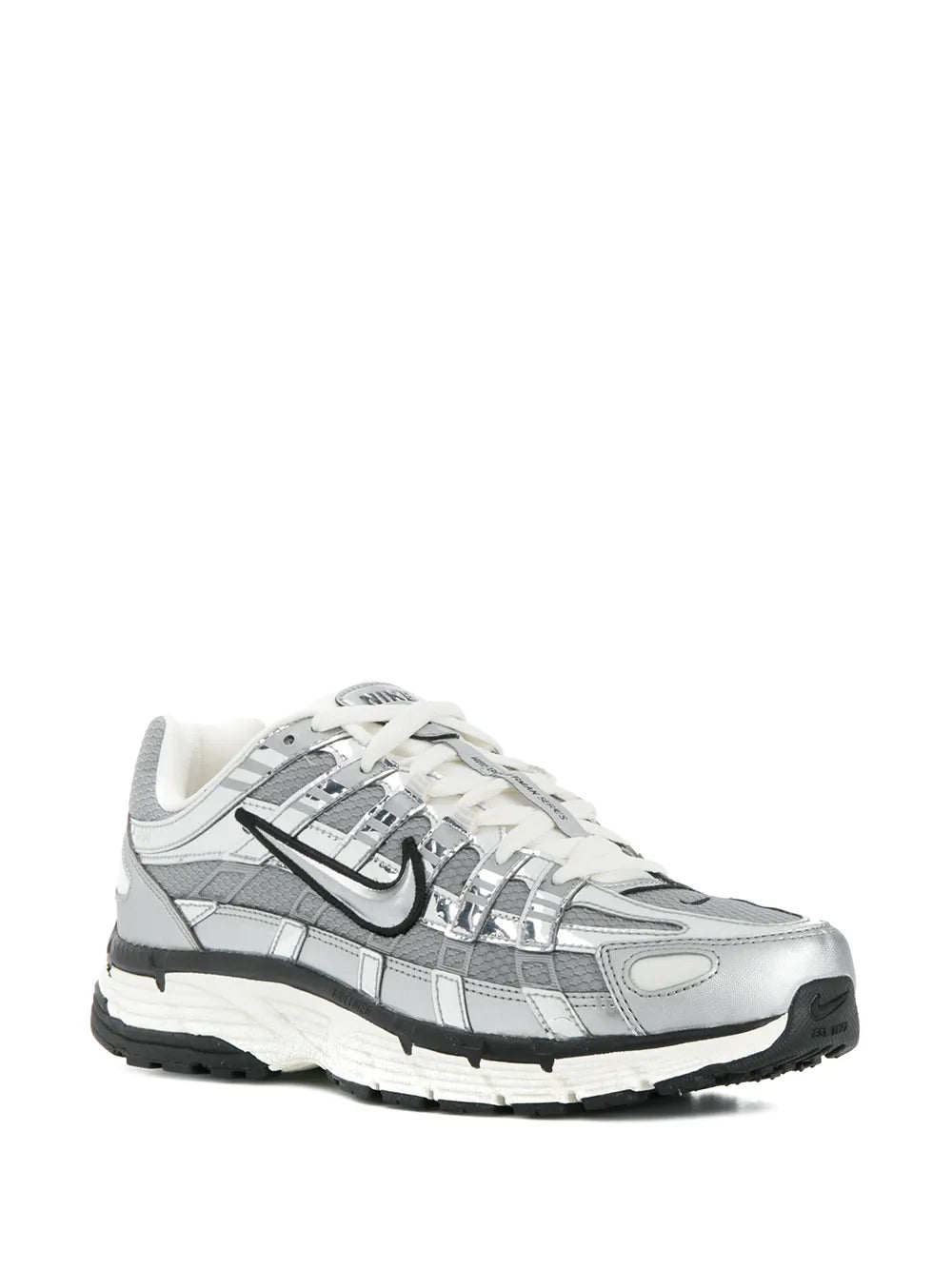 Lace-up running sneakers in white and gray with black swoosh and chunky outsole