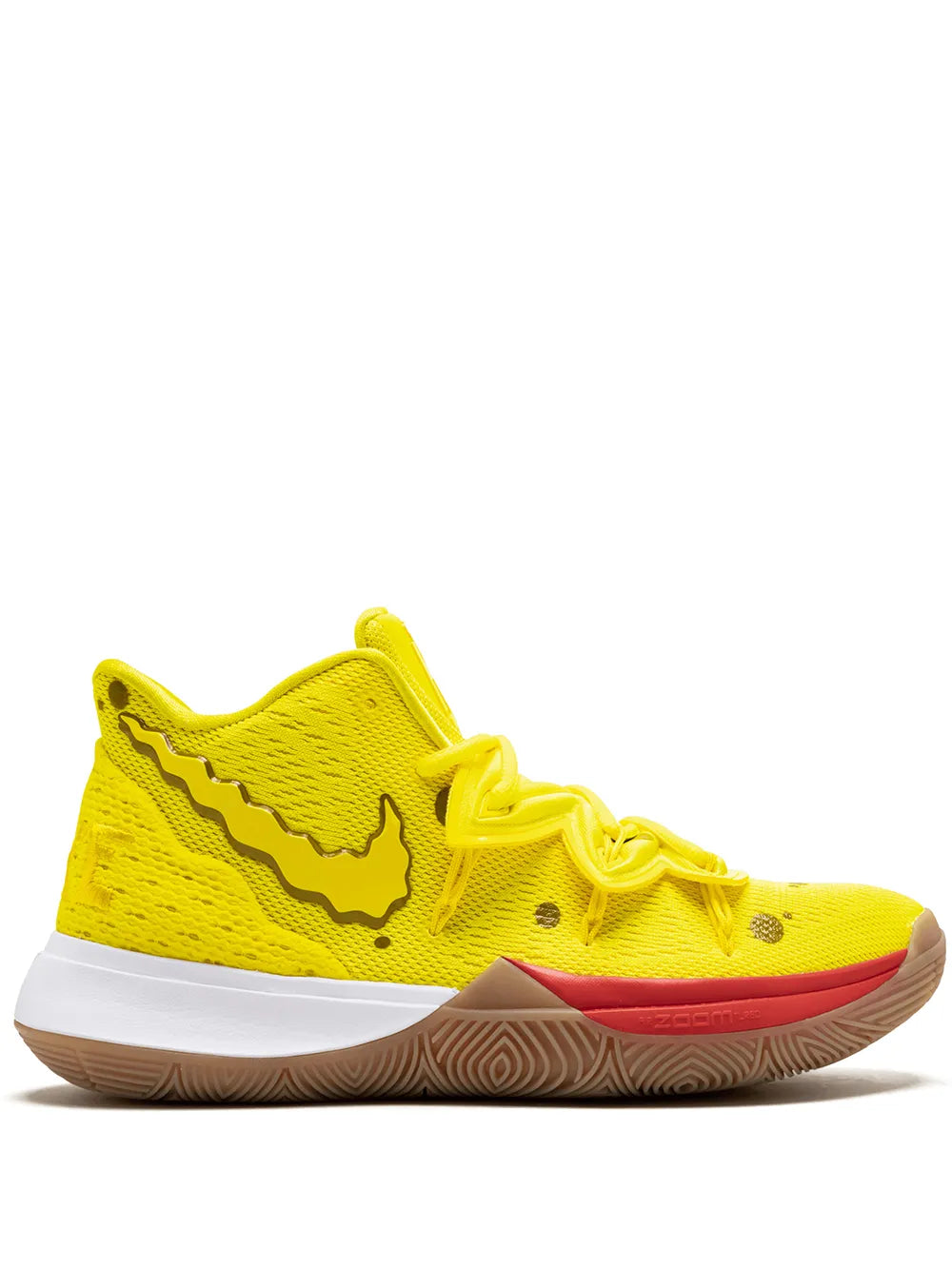 Nike Kyrie 5 yellow basketball shoe with white sole and orange heel accent