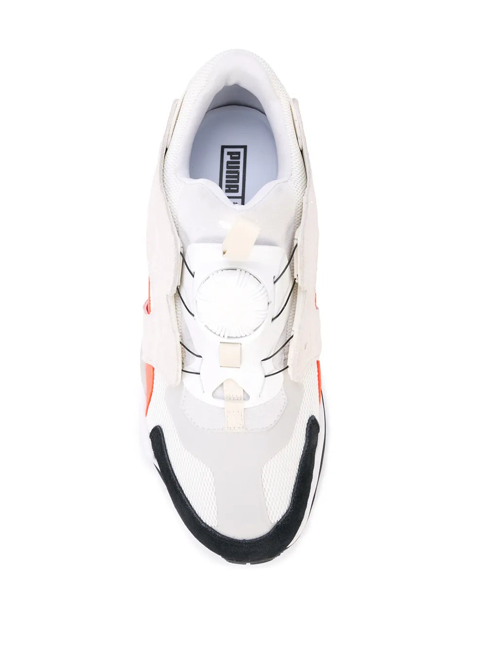 White low-top sneaker with lace-up eyelets, black heel trim, and padded collar