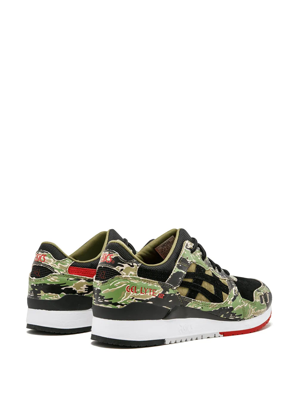 Pair of low-top camo running sneakers, lace-up, black with green pattern, red trim