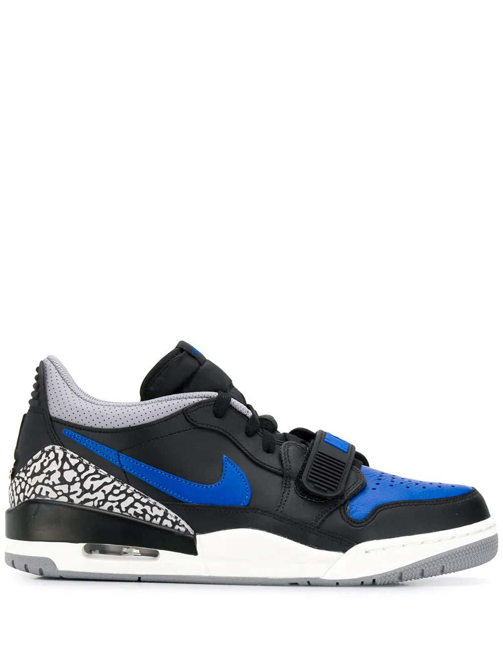 Black and blue low-top sneakers with blue swoosh and speckled heel panel