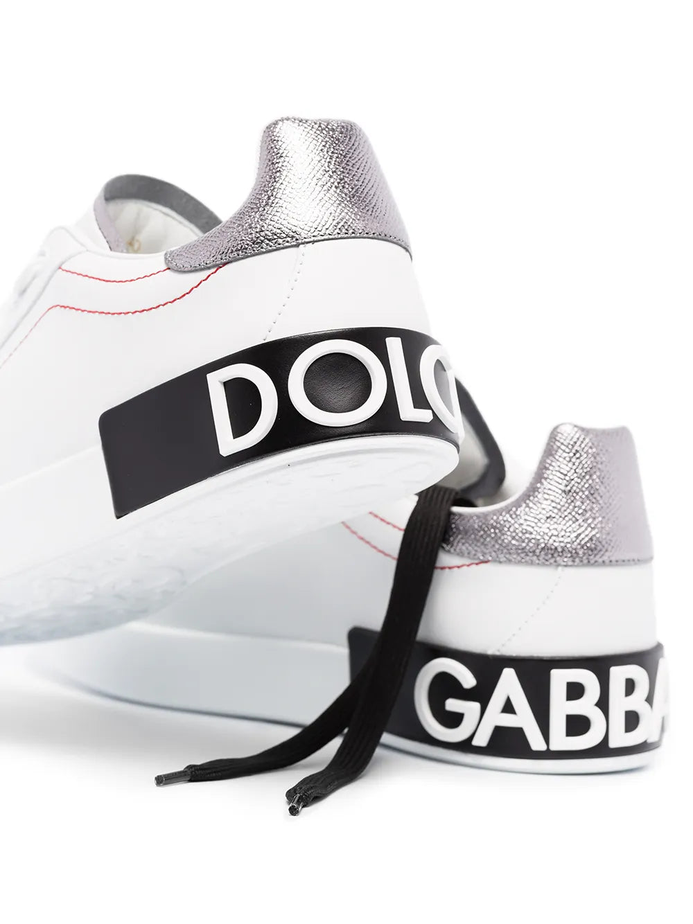 White leather sneakers with black heel logo strap and red side stitching