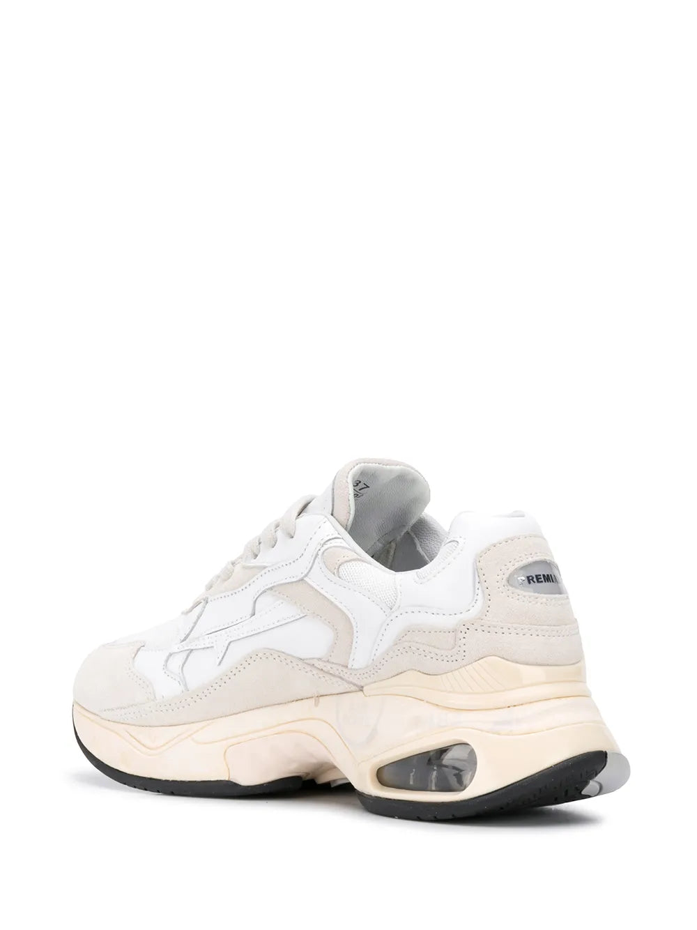Premiata white sneaker side view with beige midsole and visible air unit