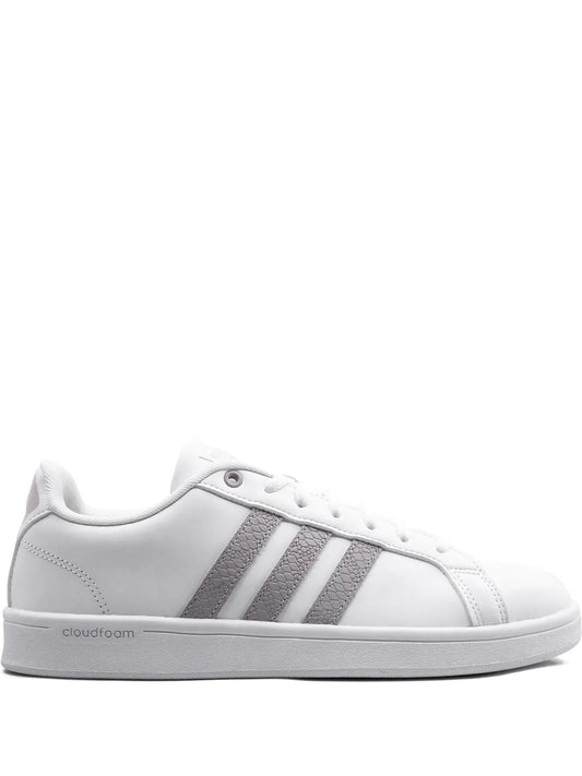 White adidas low-top sneaker with gray three-stripe design and cloudfoam sole