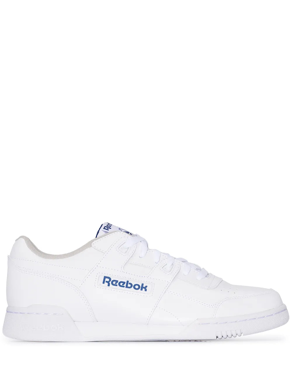 White Reebok low-top sneaker with lace-up front and side logo