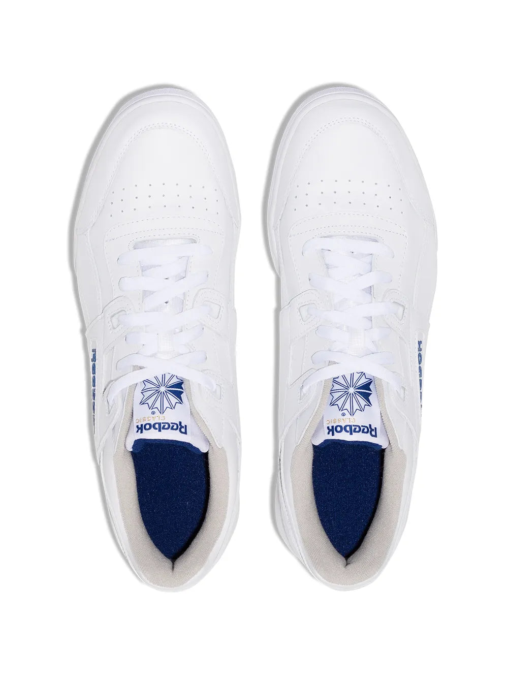 Pair of white Reebok low-top sneakers with blue tongue logo and laces