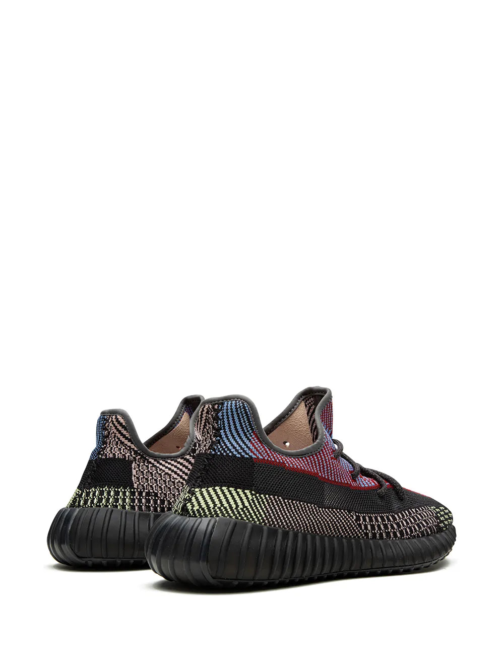Side view knit sneaker with multicolor upper, black heel, and ribbed rubber sole