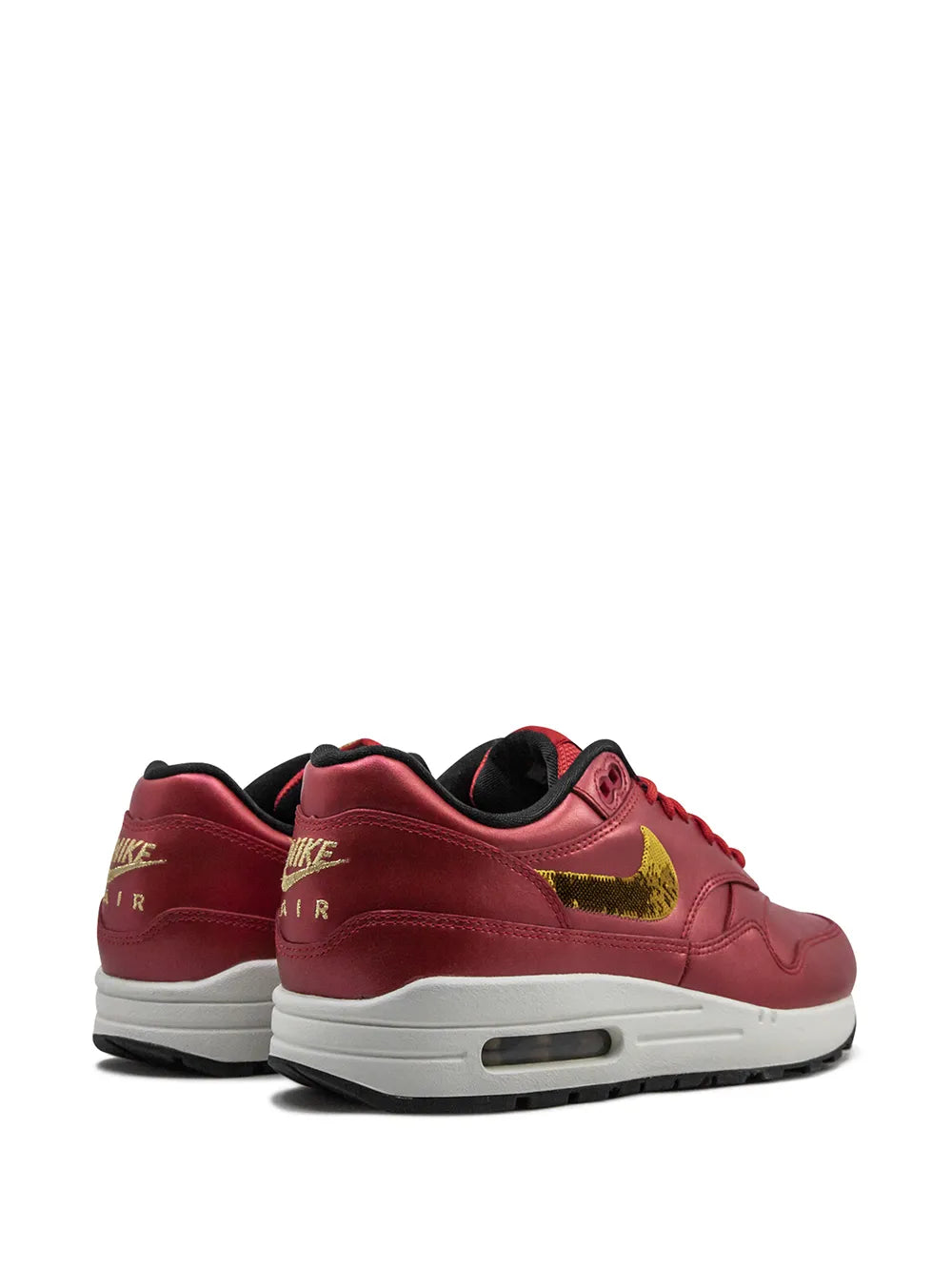 Air Max 1 red sneakers with heel pull tab and white air unit midsole