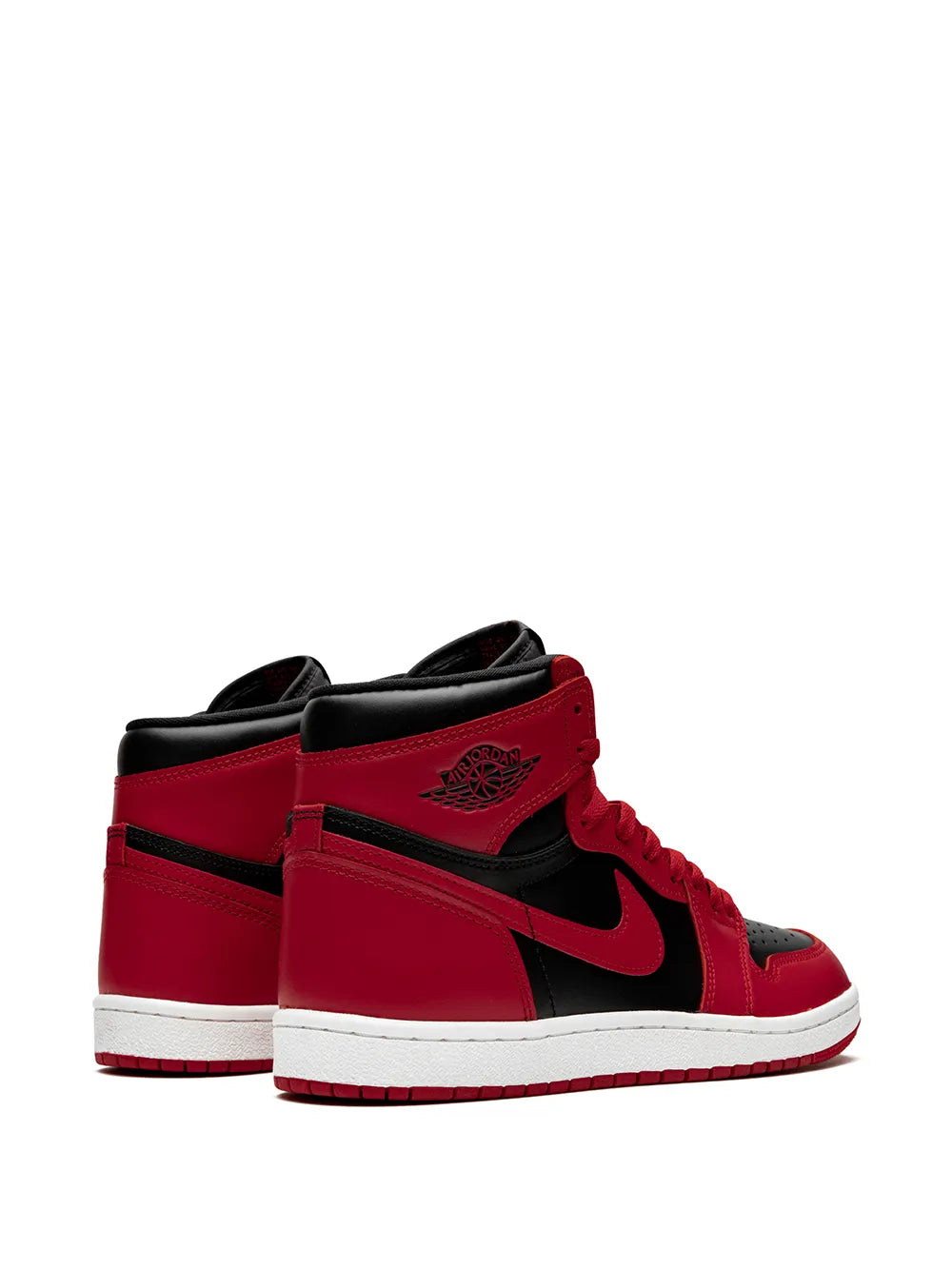 Pair of high-top sneakers, red and black with black swoosh; white midsoles.