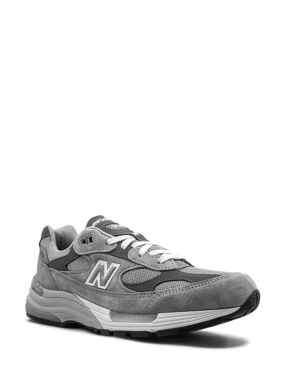 Gray lace-up athletic sneaker with side paneling and large 'N' emblem
